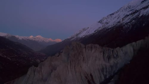 Romantic Evening Footage of High Mountain Landscape Snowcapped Mountains Lit By Last Rays of Sun