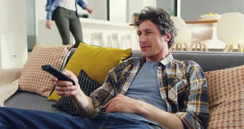 Affectionate Couple Relaxing Together on a Couch