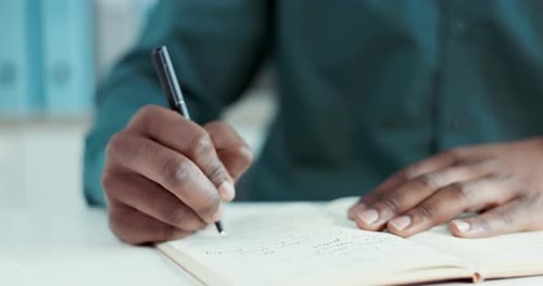 Hands, business man and writing in book, notes or paper for idea at desk