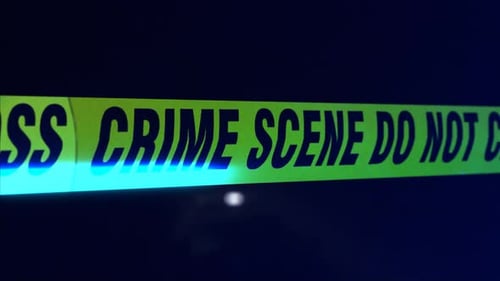 Police Crime Scene Tape with Flashing Red and Blue Lights