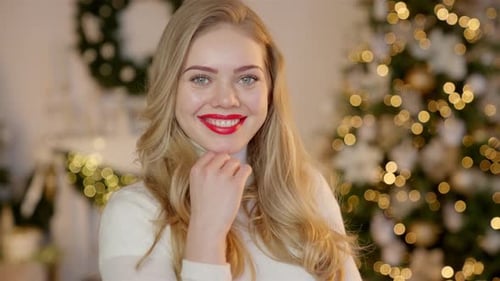 Beautiful Young Woman Smiling in Holiday Setting