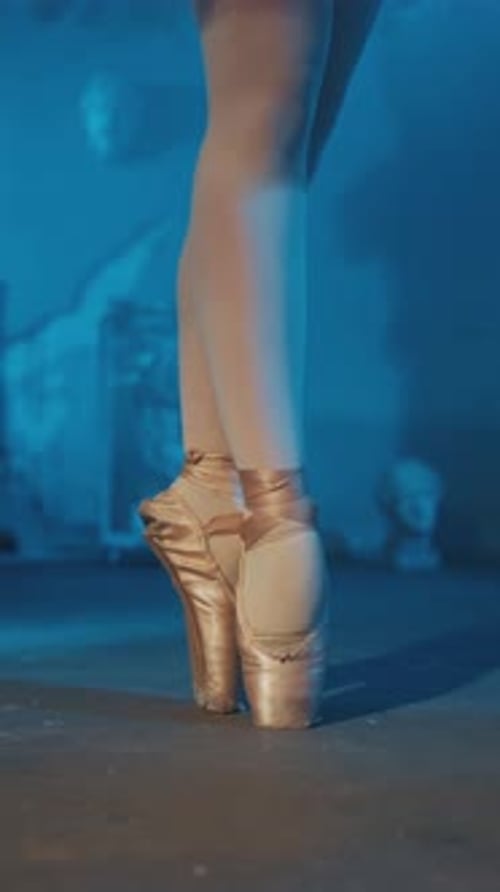 Closeup View of Feet of Talented Ballerina Dancing Alone on Stage of Theatre Classical Music and