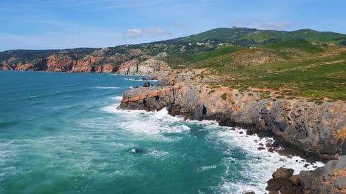 Sunny Beautiful Seascape Ocean Waves Splashing on Rocky Coast Aerial Foamy Sea