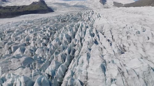 Aerial view flying above of the glacier edge breaking in Iceland