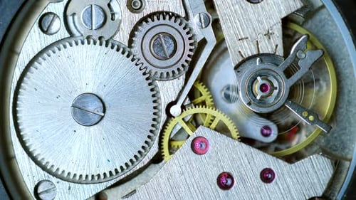 A Close Up of the Inside of a Watch with Gears