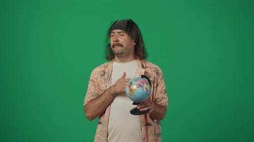 Excited Man Planning Travel on Globe