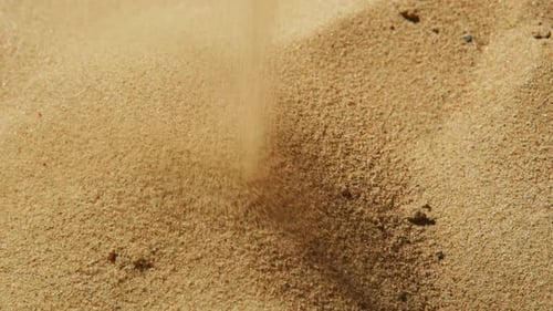 Natural Sand Formation Captured in Closeup As Grains Shift During a Gentle Breeze