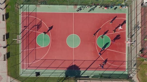 Aerial Video Intense Basketball Match on a WellDesigned Outdoor Court Captured From a High