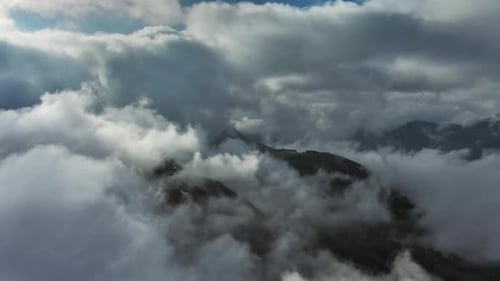 Aerial High View of Dramatic Clouds Flying