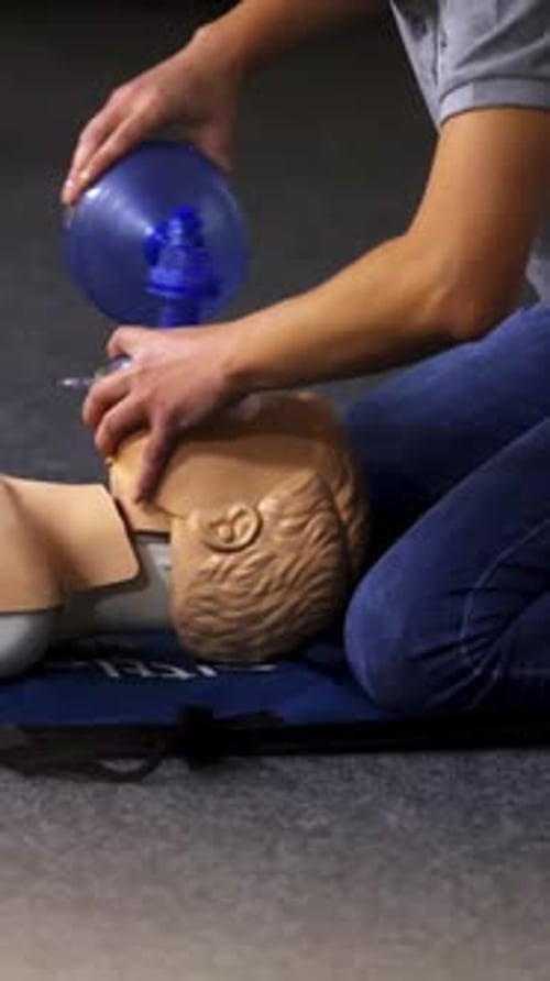 Practicing CPR on Medical Dummy with Bag Valve Mask