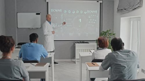 Mature Caucasian Doctor Giving Lecture