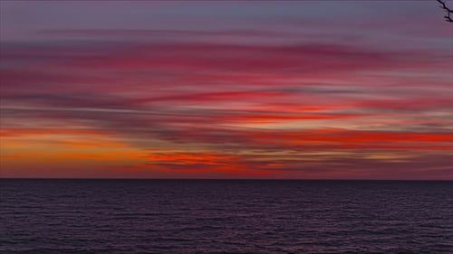 Beautiful Ocean Sunset with Time Lapse Clouds