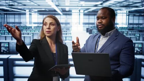 Teamworking Colleagues Doing Checkup in Data Center