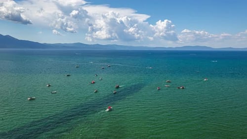 Aerial View Of Motorboats Cruising in Lake Tahoe. - hyperlapse shot