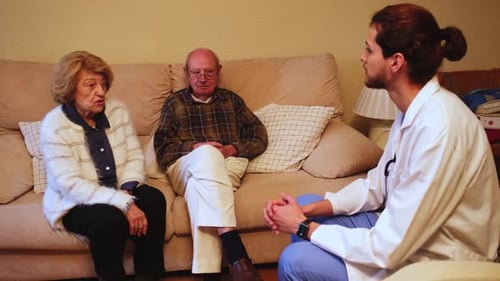 Doctor Visiting Senior Couple in Their Home