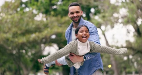 Family, park and father playing with child for bonding, relationship and flying in air outdoors