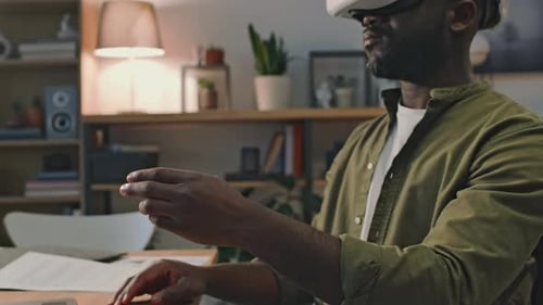 Man Uses VR Headset in Home Setting