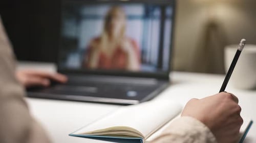 Remote Video Call on Laptop, Taking Notes