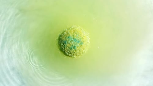 Bath Bomb Dissolving in Water, Close Up