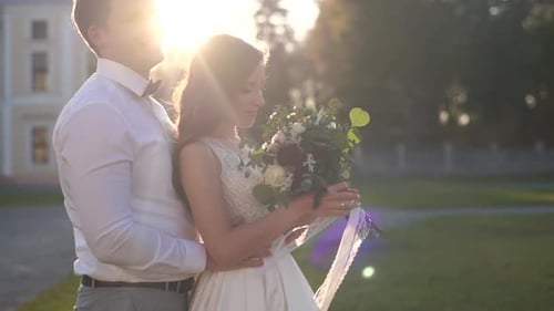 Wedding couple in the park. Young couple in love at sunset