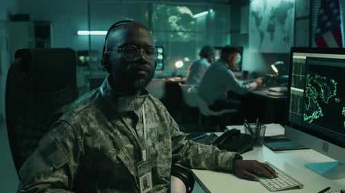 Portrait of Black Male Satellite Operator at USA Army Command Center