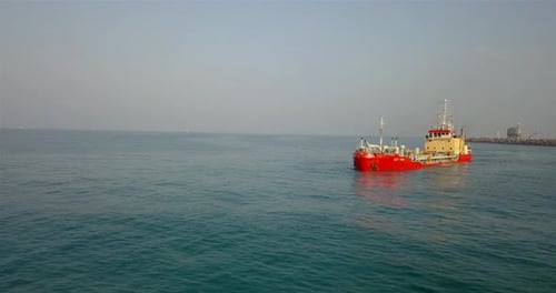 Aerial footage over Sand dredging ship in Mediterranean Sea