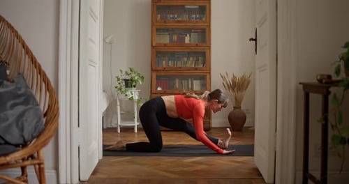 Woman Doing Yoga Workout at Home