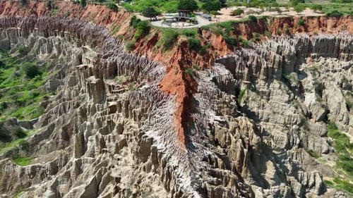 Aerial View Of Majestic Red And White Rock Formation Canyons
