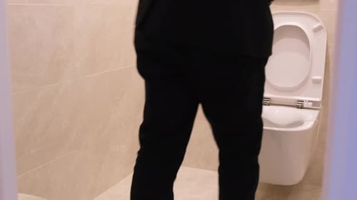 A Male Office Worker Went to the Toilet