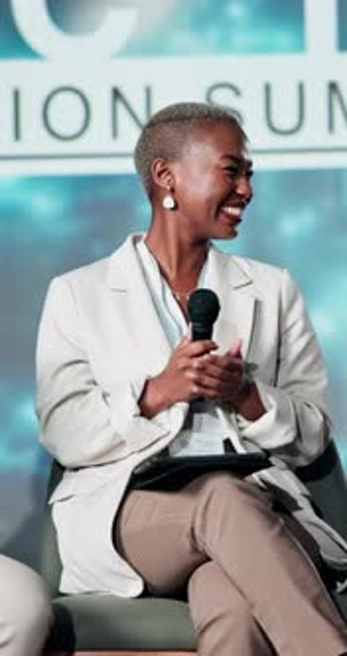 Woman Speaking at Corporate Conference