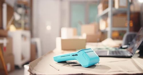 Blue Card Reader and Laptop on Table