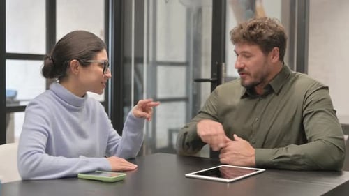 Business Meeting with a Tablet and Smartphone
