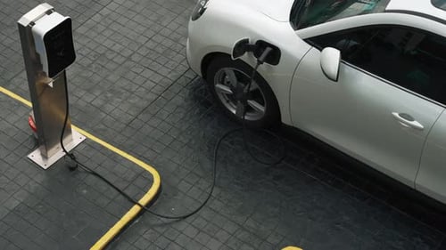 Progressive Innovation Urban Electric Onstreet Charging Station with EV Car