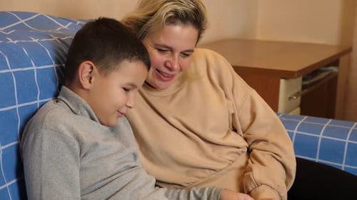 Mother and Child Drawing Together at Home