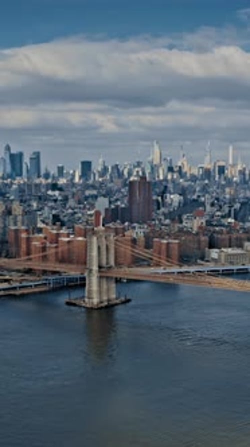 Stunning aerial view of Brooklyn Bridge and Manhattan skyline in New York