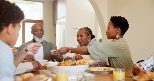 Family Enjoys Meal Together at Home