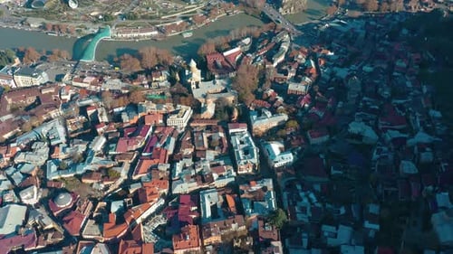 Aerial View Of Dzveli Tbilisi, Bridge of Peace And Rike Park In Tbilisi, Georgia. - tilt up