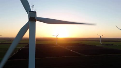 Aerial view of wind turbines at sunset, United Kingdom.