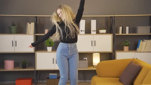 Crazy and energetic young girl dancing.