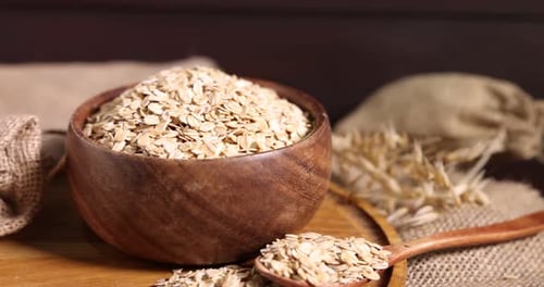 Rustic Display of Oats in Wooden Bowl