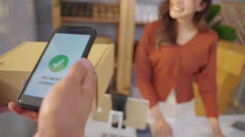 Payment Complete Customer Receives Order After Successful Mobile Transaction
