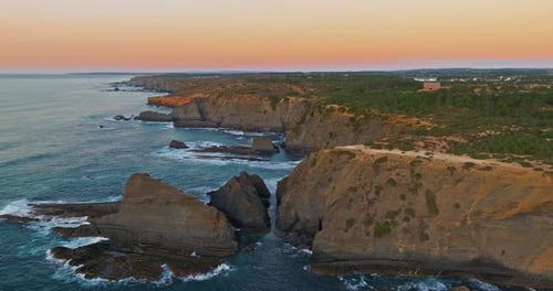 Aerial View Over Long Rocky Coastline in Portugal on Sunset Beautiful Natural Landscape with Ocean