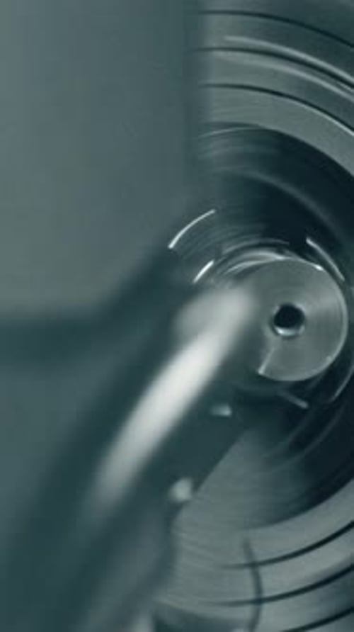 Precision drilling of metal workpiece in industrial workshop