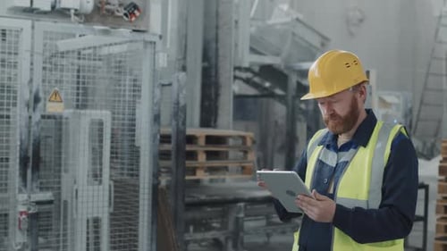 Engineer Working On Digital Tablet