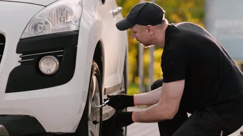Mechanic Fixes Car