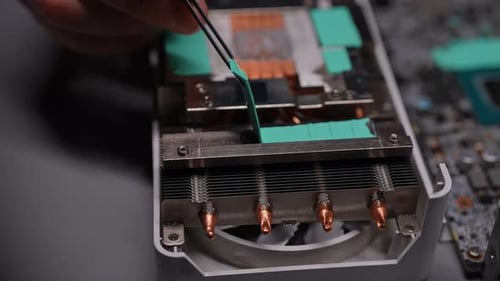 Close Up Disassembling a Computer Graphics Card