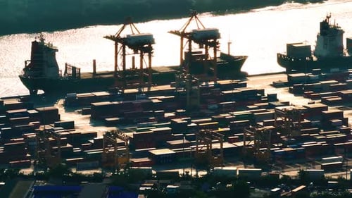 Exploring the bustling activities at Bangkok Port during the golden hour