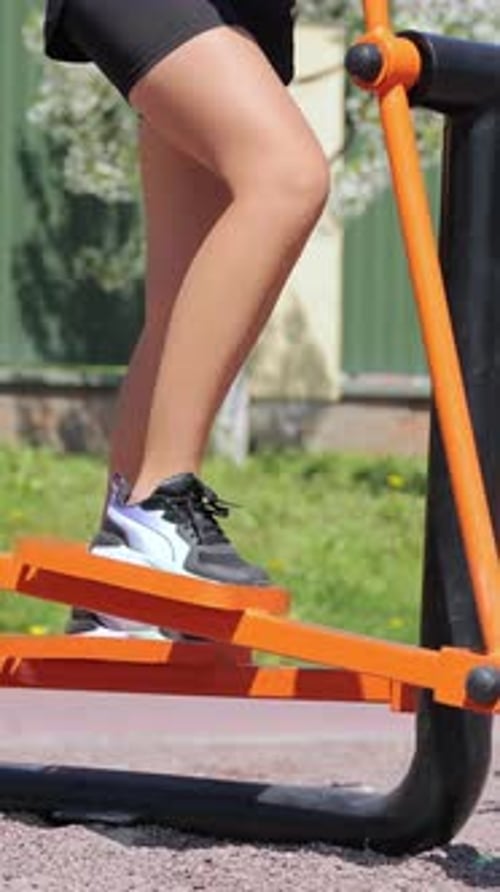 Legs Pumping on Outdoor Elliptical Machine
