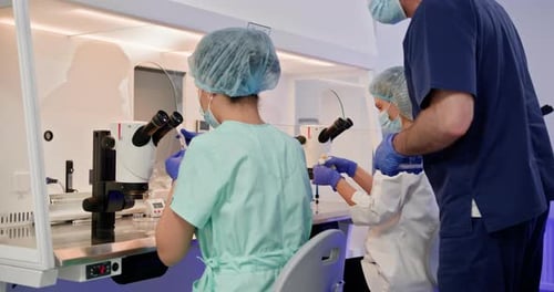 Medical Professionals Working Diligently in Modern Laboratory