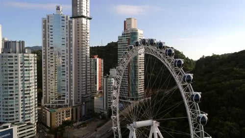 Ferris Wheel and City Skyline Aerial View